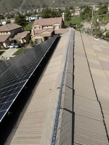 Mesh installed around the edge of a rooftop solar array