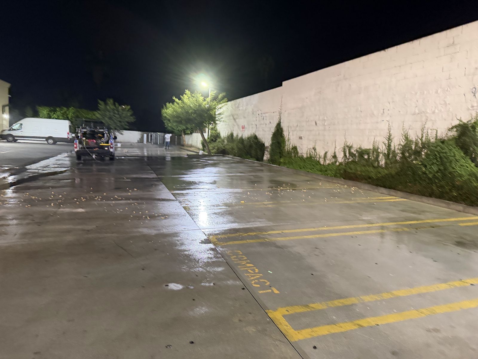 Commercial parking lot cleaned at night