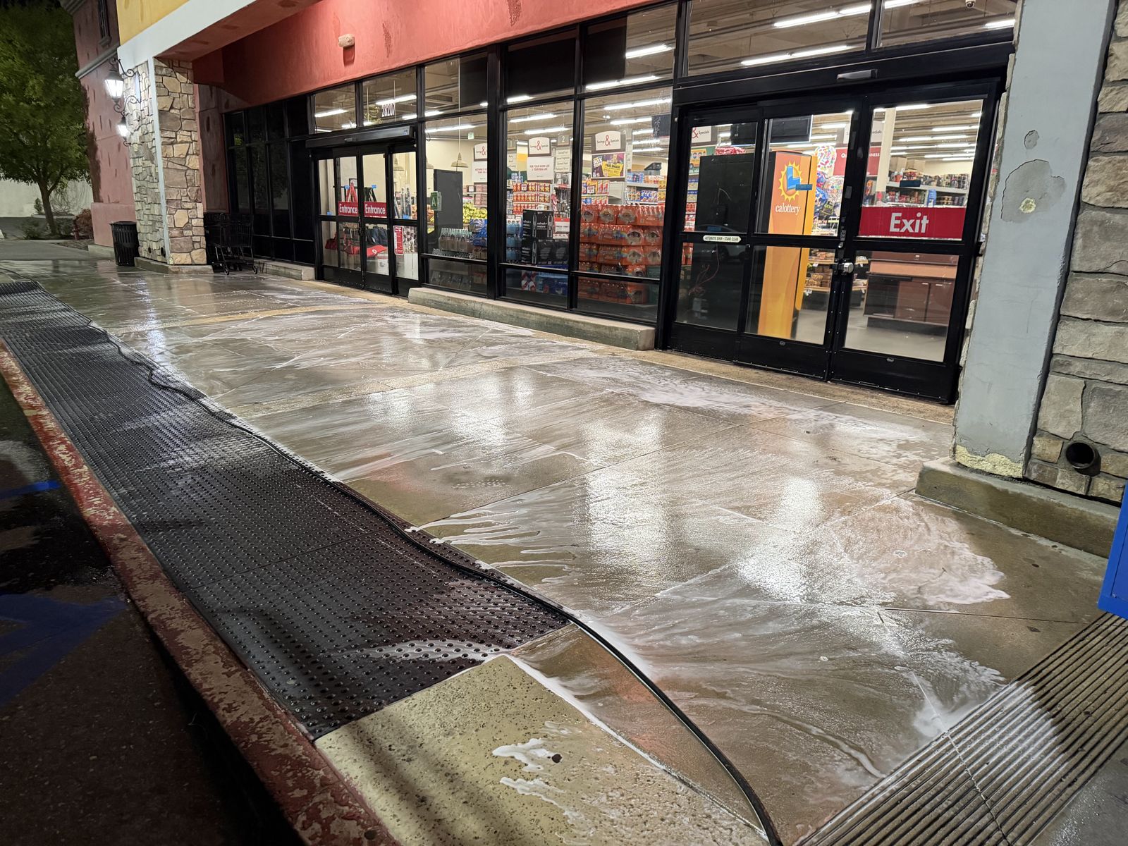 Restaurant and retail storefront walkway after pressure washing