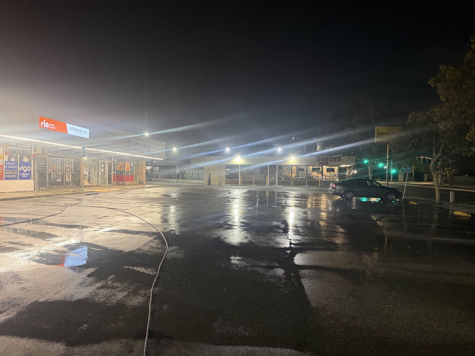 Commercial drive-through and parking area cleaned at night