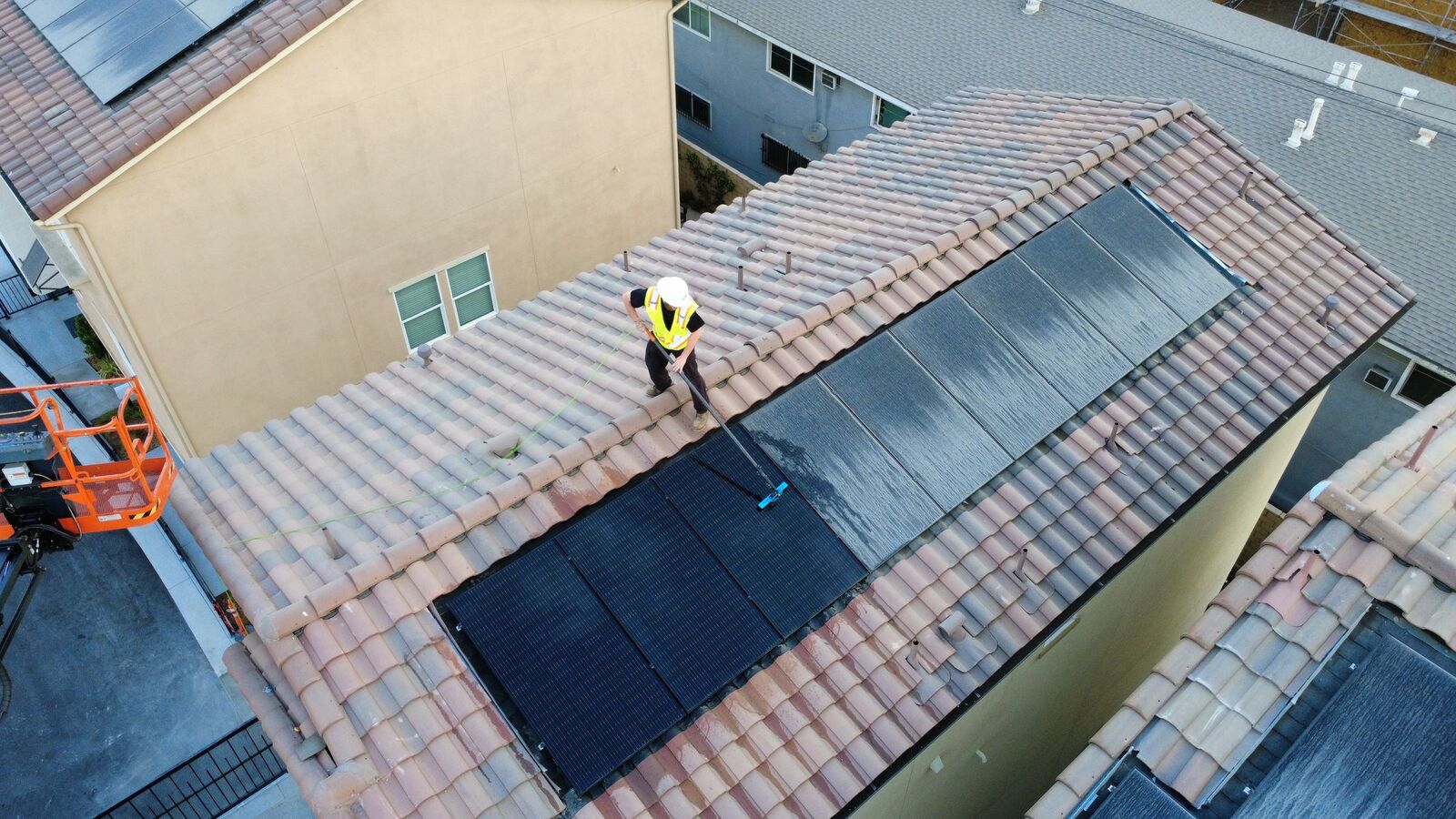 Commercial solar panel cleaning on a new build community