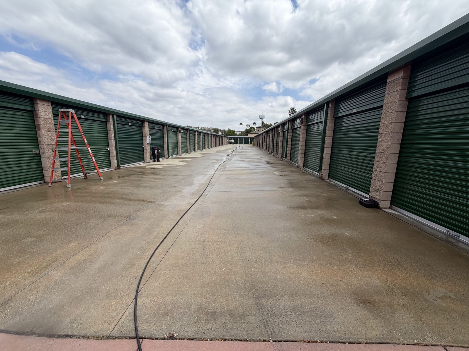 Self-storage facility aisle during cleaning