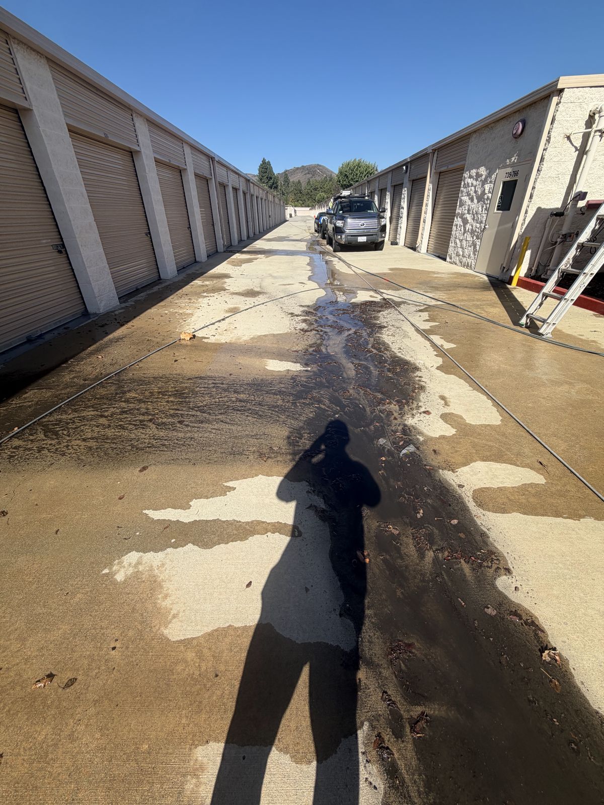 Storage facility aisle mid-cleaning