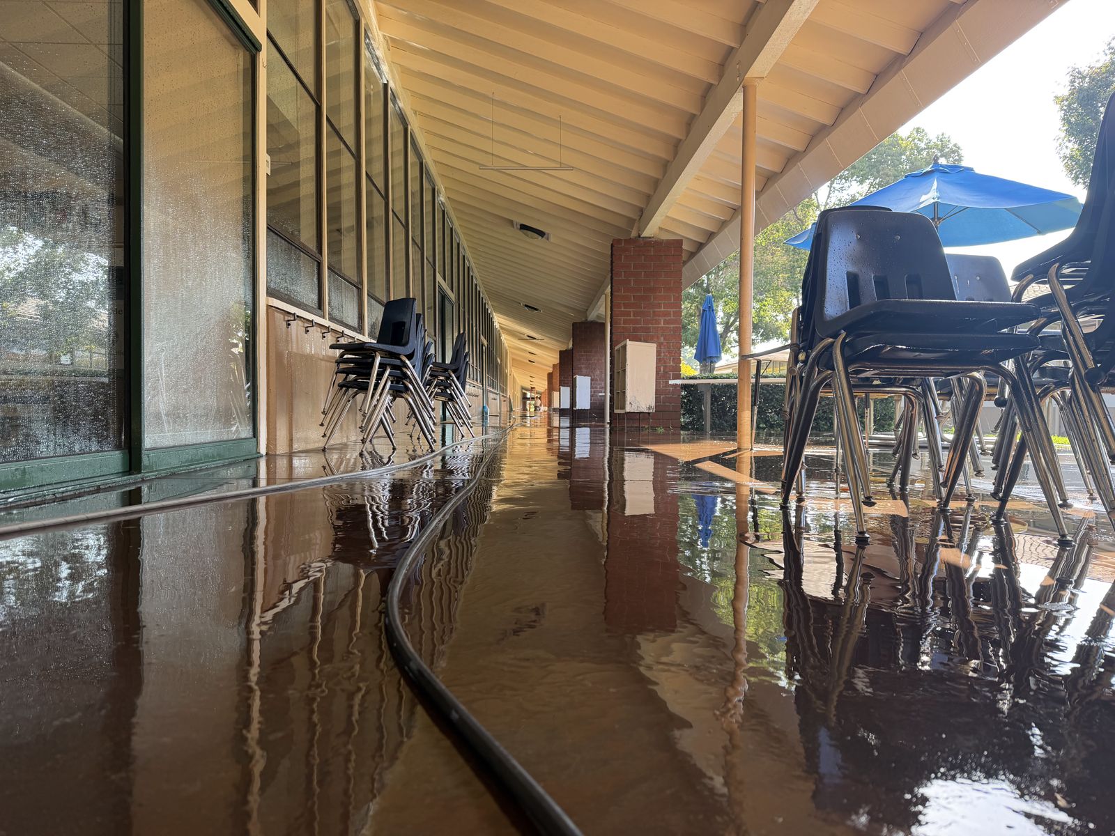 Campus covered walkway after public works cleaning