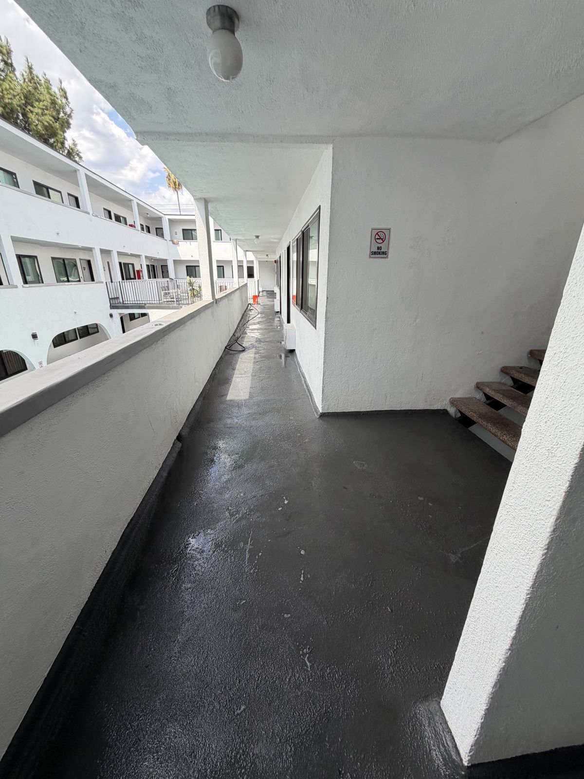 Exterior corridor after pressure washing